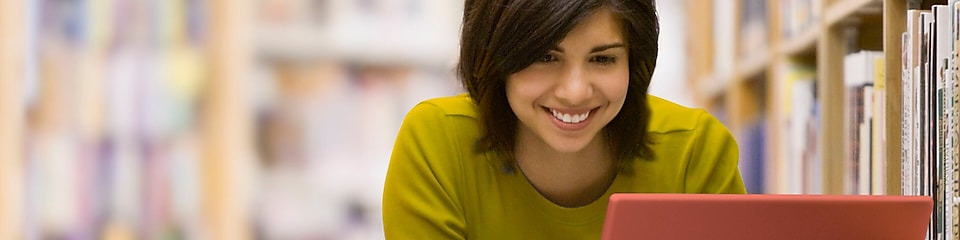 Woman looking at her laptop screen